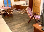 soggiorno con angolo cottura